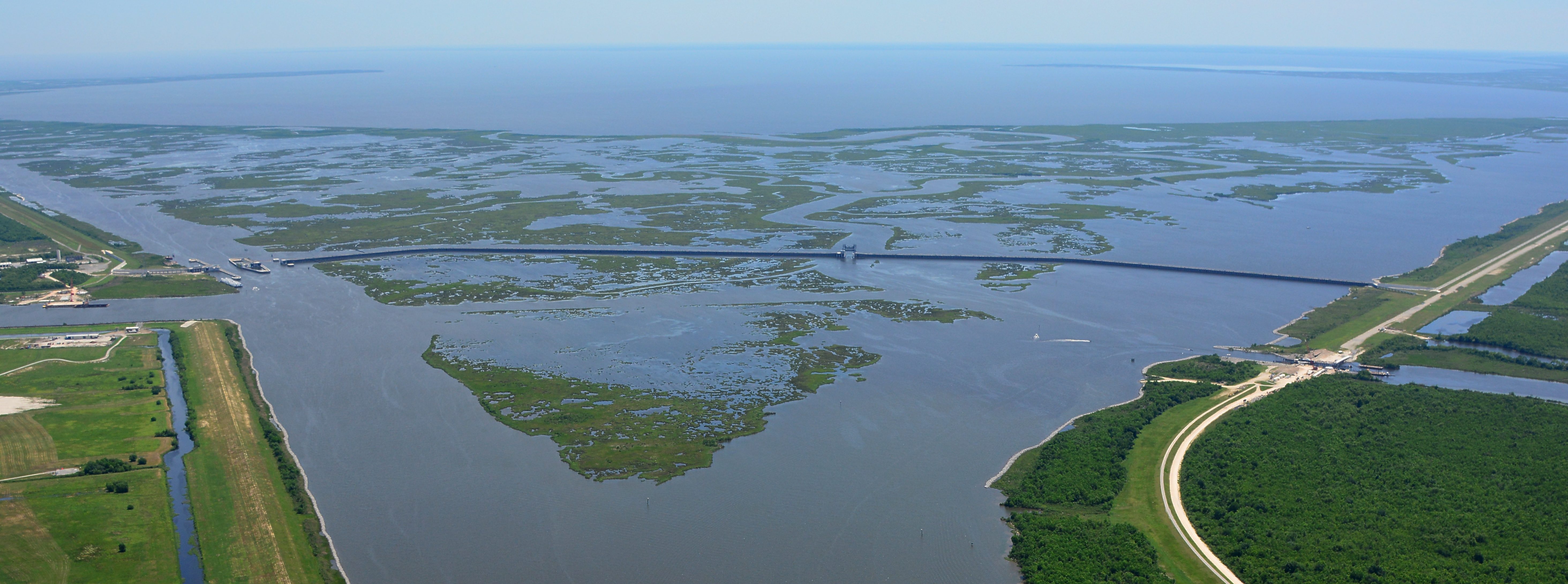 grid-breaking A storm surge barrier in Louisiana, which closed the Gulf Outlet shipping canal in 2010. Gulf of Mexico in the distance. Photo credit: US Army Corps of Engineers.